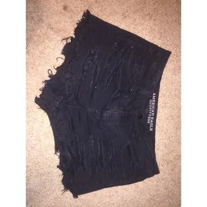 high-waisted distressed black shorts